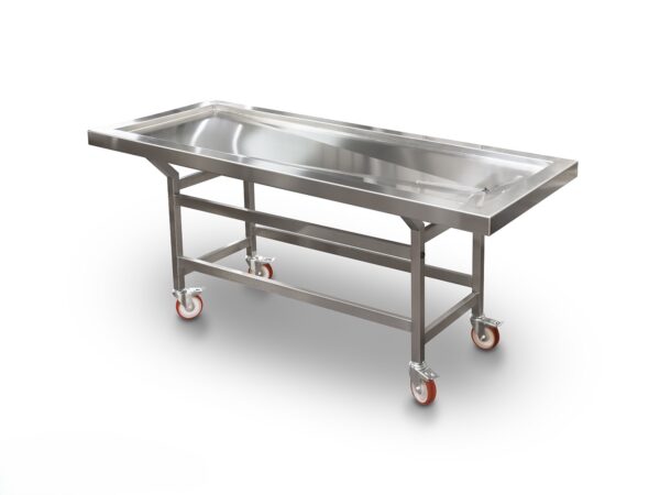 Vista lateral de carro post-mortem con superficie inclinada y ruedas bloqueables